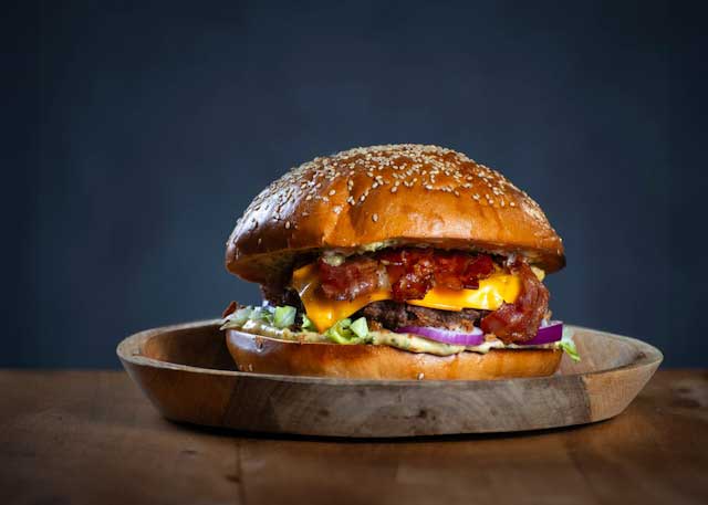 Quarter pounder cheeseburger stacked high